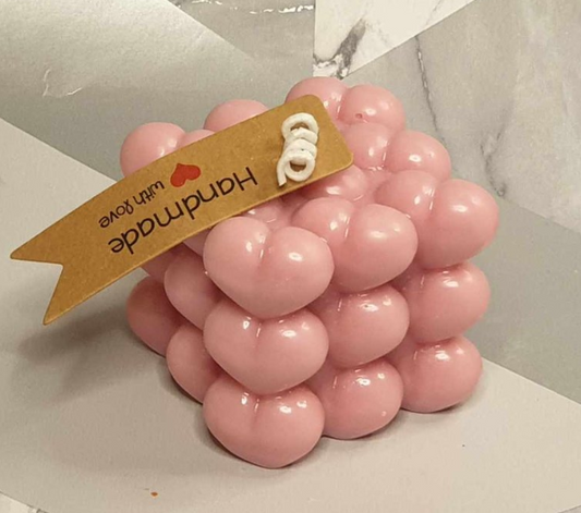Handmade pink heart-shaped pillar bubble candle with floral scent, crafted from eco-friendly soy wax. Perfect for romantic gifts, home décor, or special occasions.