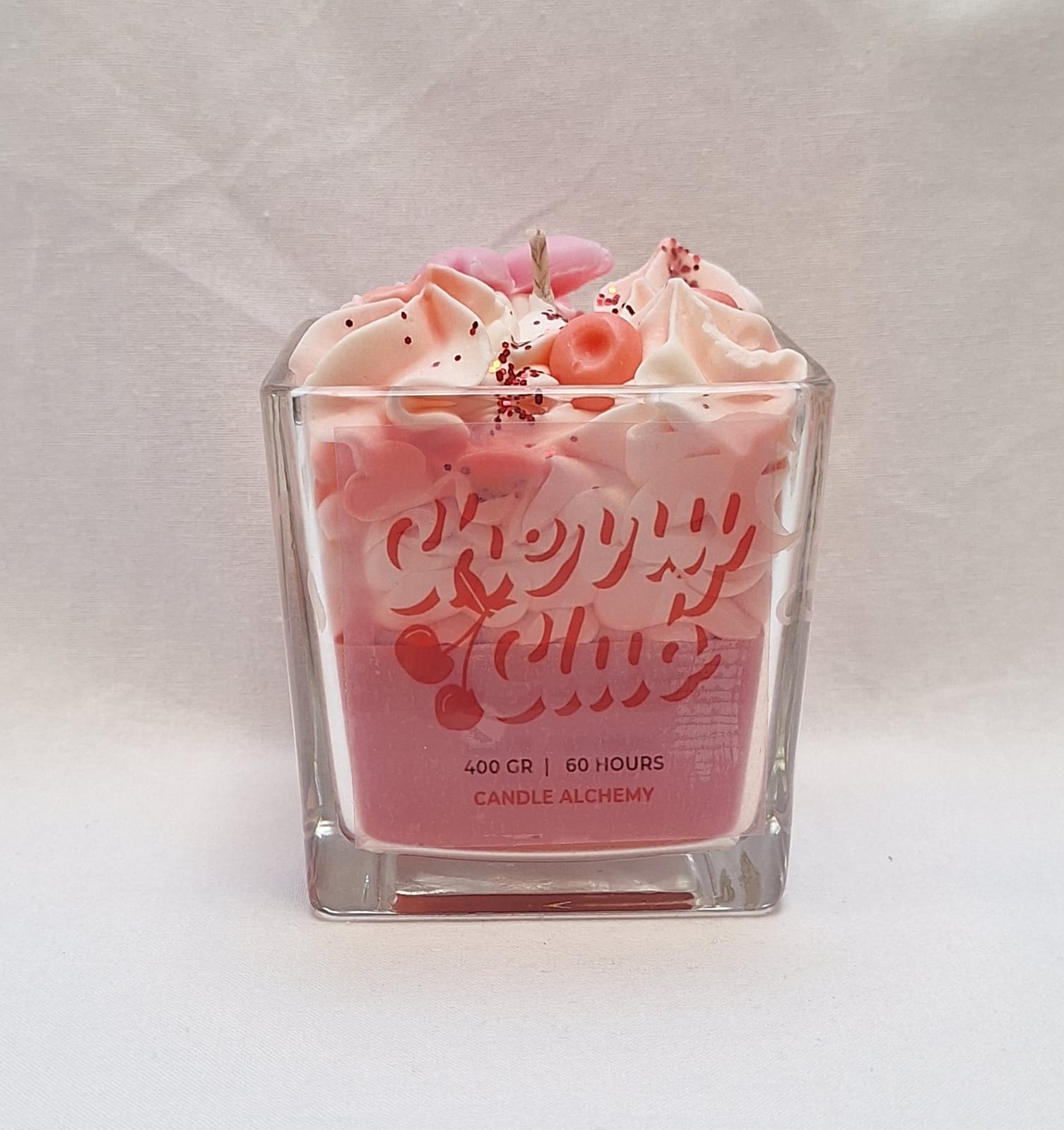Pink and white cherry whipped soy candle in a glass jar with decorative toppings, handmade, perfect for romantic gifts, self-care.