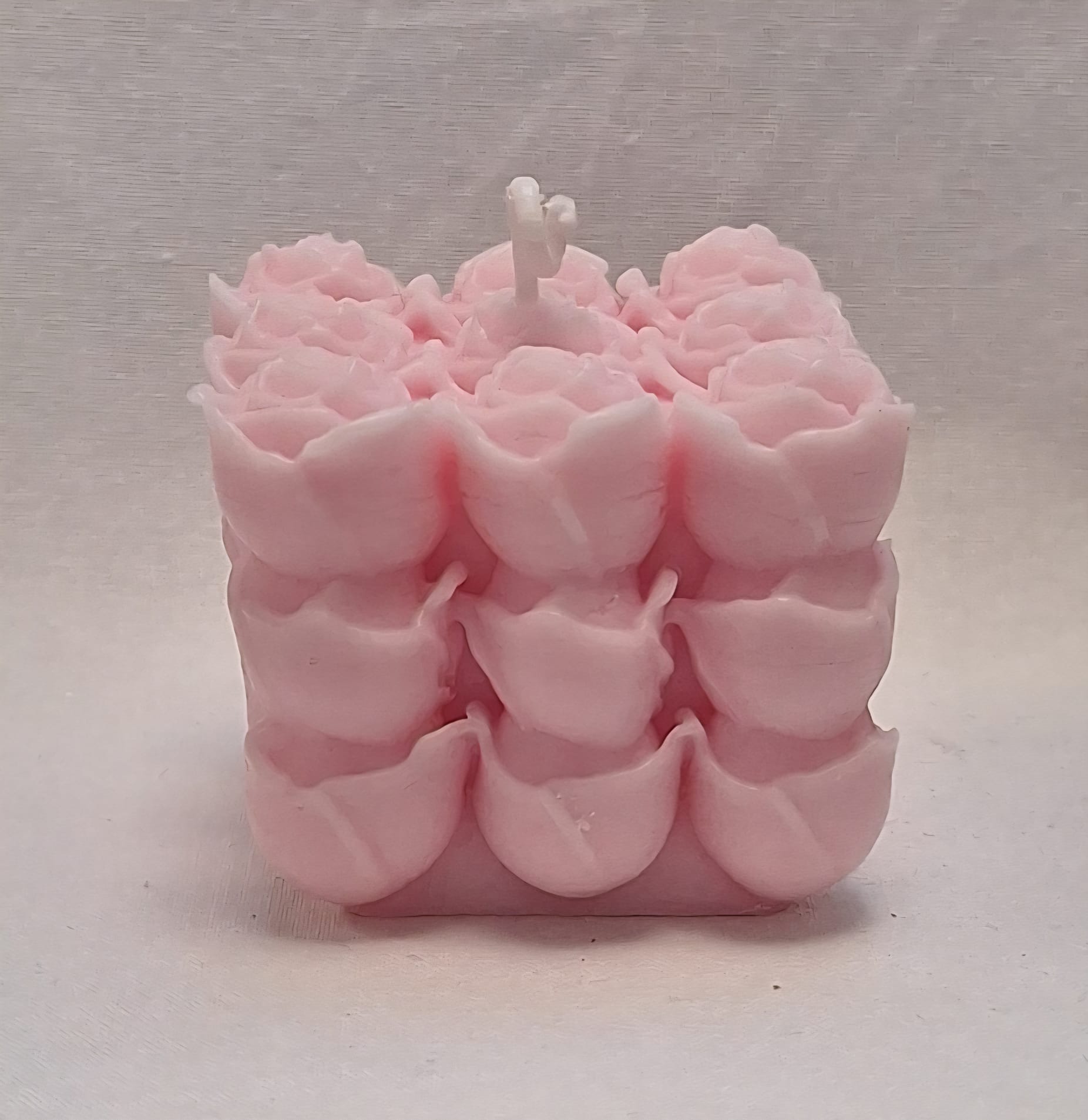Pink handmade rose cube candle with sculpted floral detailing, ideal for romantic gifts or home décor.