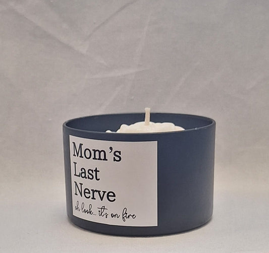 Mom’s Last Nerve scented candle in a stylish tin container with a playful label, perfect stress relief gift for moms.